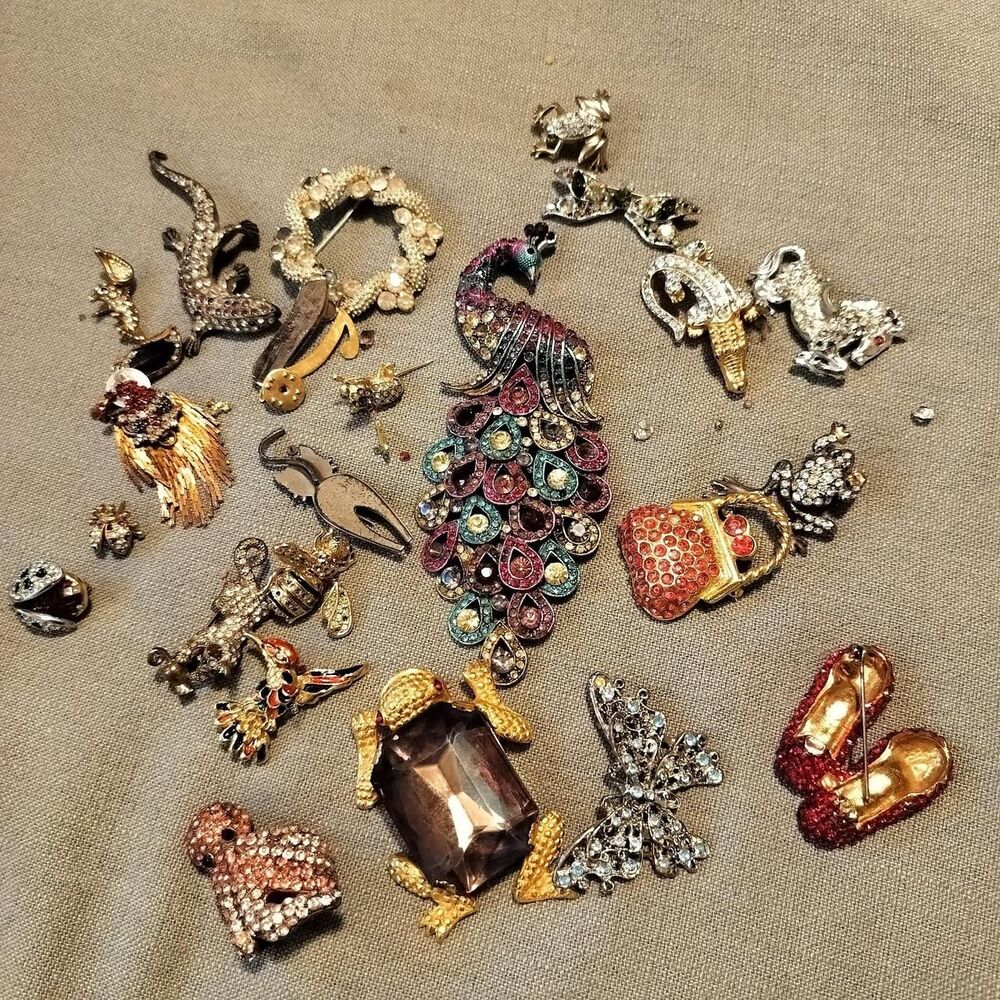 vintage rhinestone brooches and jewelry for parts or repair.